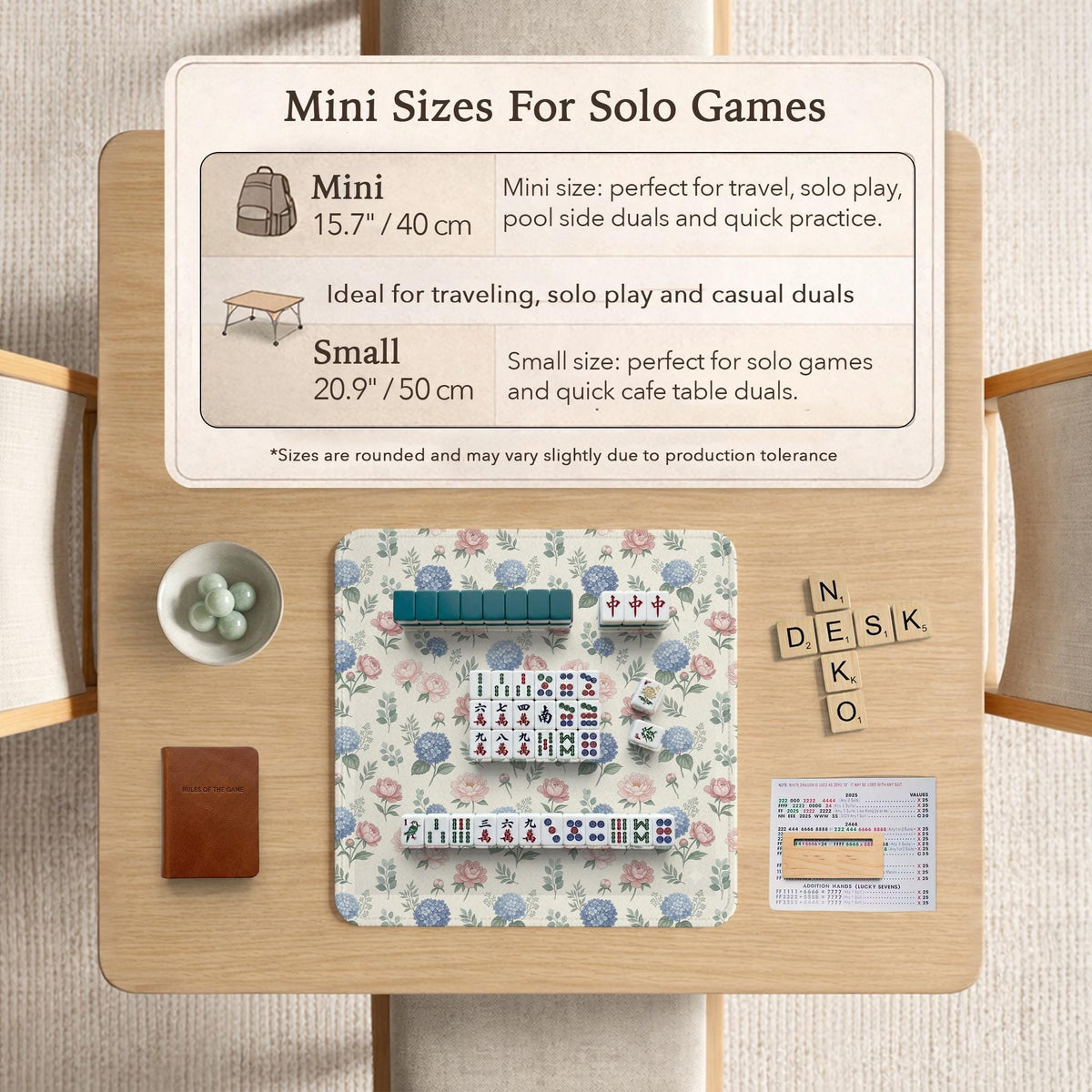 Pink floral mahjong table mat with peonies, blue hydrangeas, sage green leaves, and an ivory background.