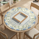 A square mahjong mat with blue hydrangea flowers, green vines, a cream background, a striped center, and printed rules around the border.