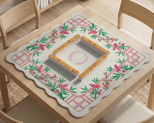 Pink cherry blossom floral mahjong table mat with a cream center and bamboo-style border design.