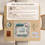 Pink cherry blossom floral mahjong table mat with a cream center and bamboo-style border design.