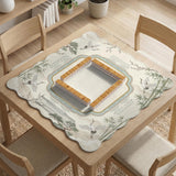 Sage green scalloped mahjong mat with bamboo, crane, and blossom illustration and printed rules around the border.