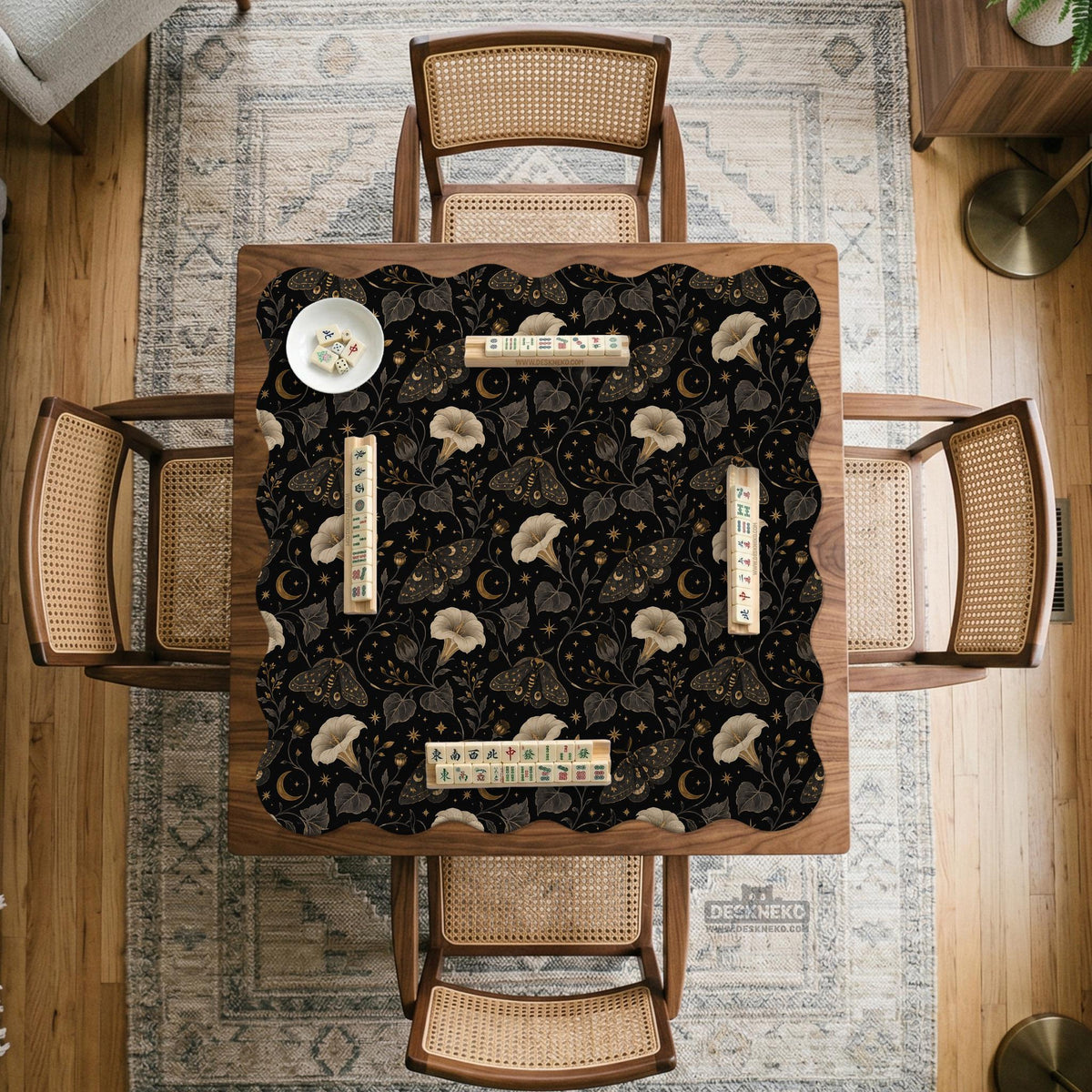 Black square mahjong mat with moths, moonflowers, crescent moons, and scattered stars in a celestial floral pattern.