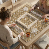 Beige mahjong mat with a white blossom branch floral pattern on a neutral background.