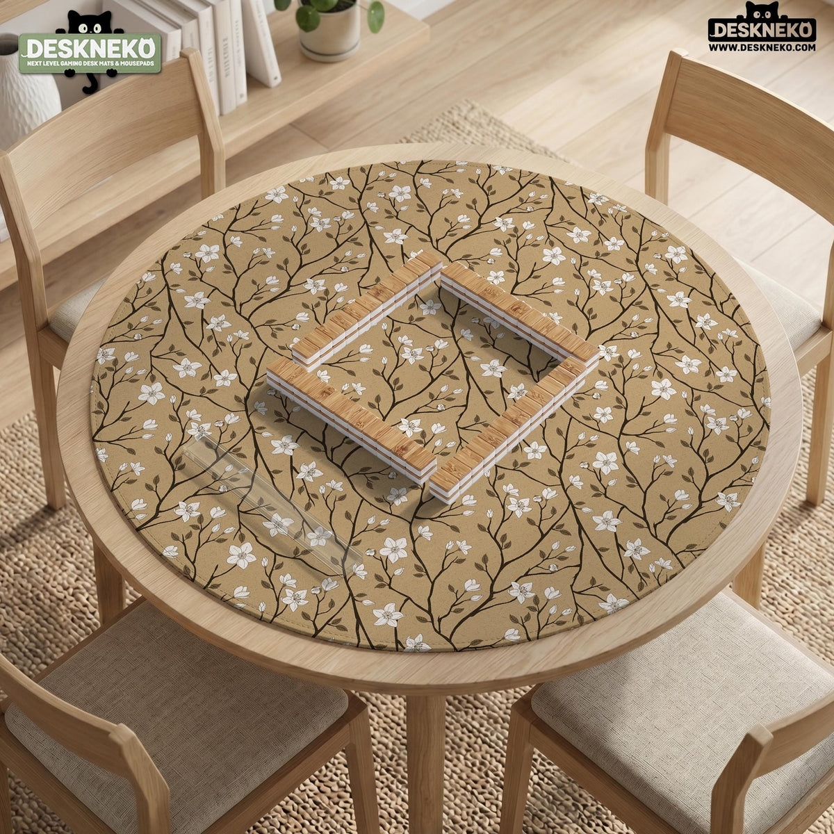 Beige mahjong mat with a white blossom branch floral pattern on a neutral background.