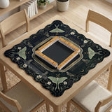 A dark floral mahjong mat with a scalloped edge, moth and flower artwork, and an American Mahjong rules layout on a dark background.