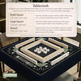 A dark floral mahjong mat with a scalloped edge, moth and flower artwork, and an American Mahjong rules layout on a dark background.