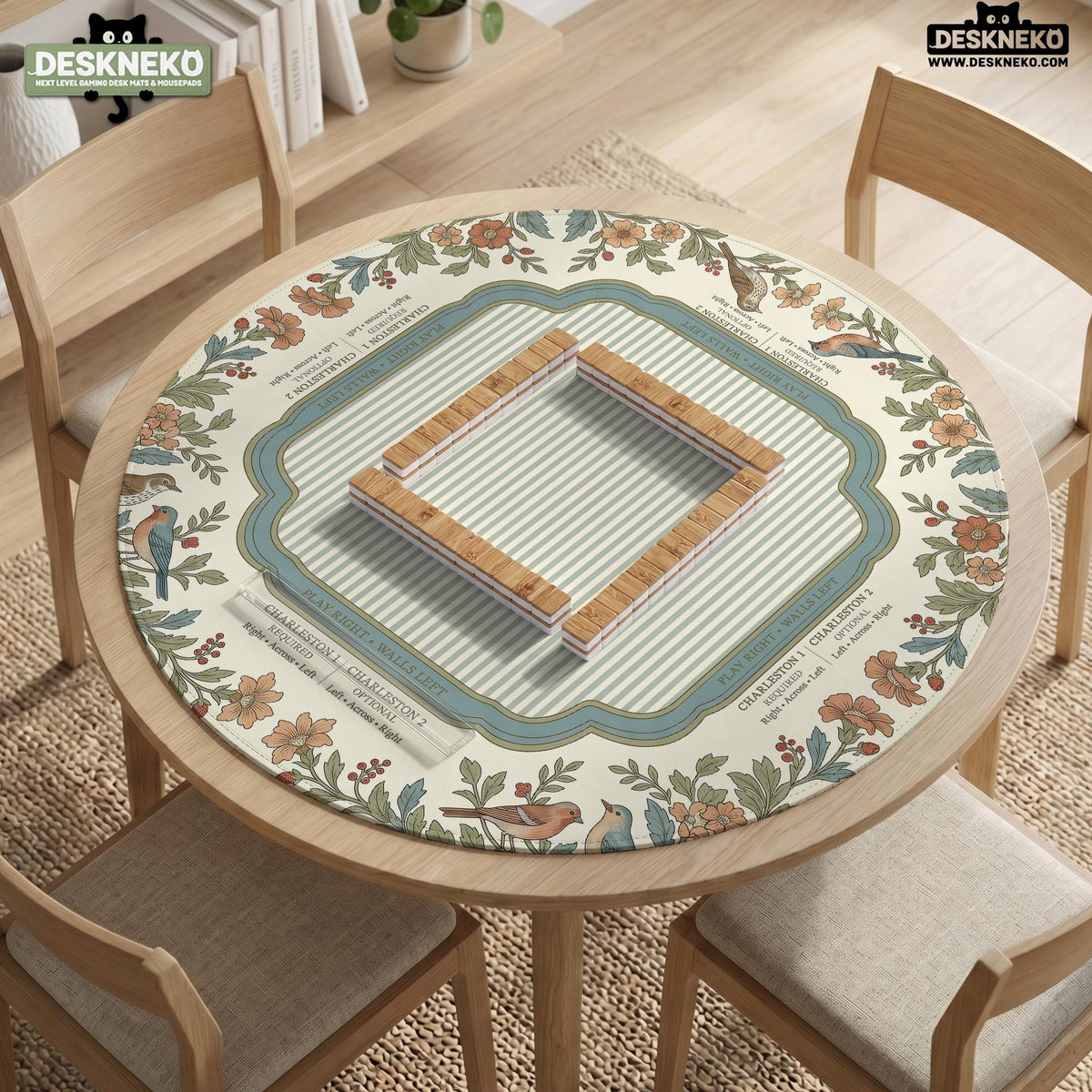 Square mahjong mat with a cream background, blue birds, sage leaves, terracotta flowers, and a decorative botanical border with printed rules text.