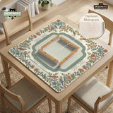 Square mahjong mat with a cream background, blue birds, sage leaves, terracotta flowers, and a decorative botanical border with printed rules text.