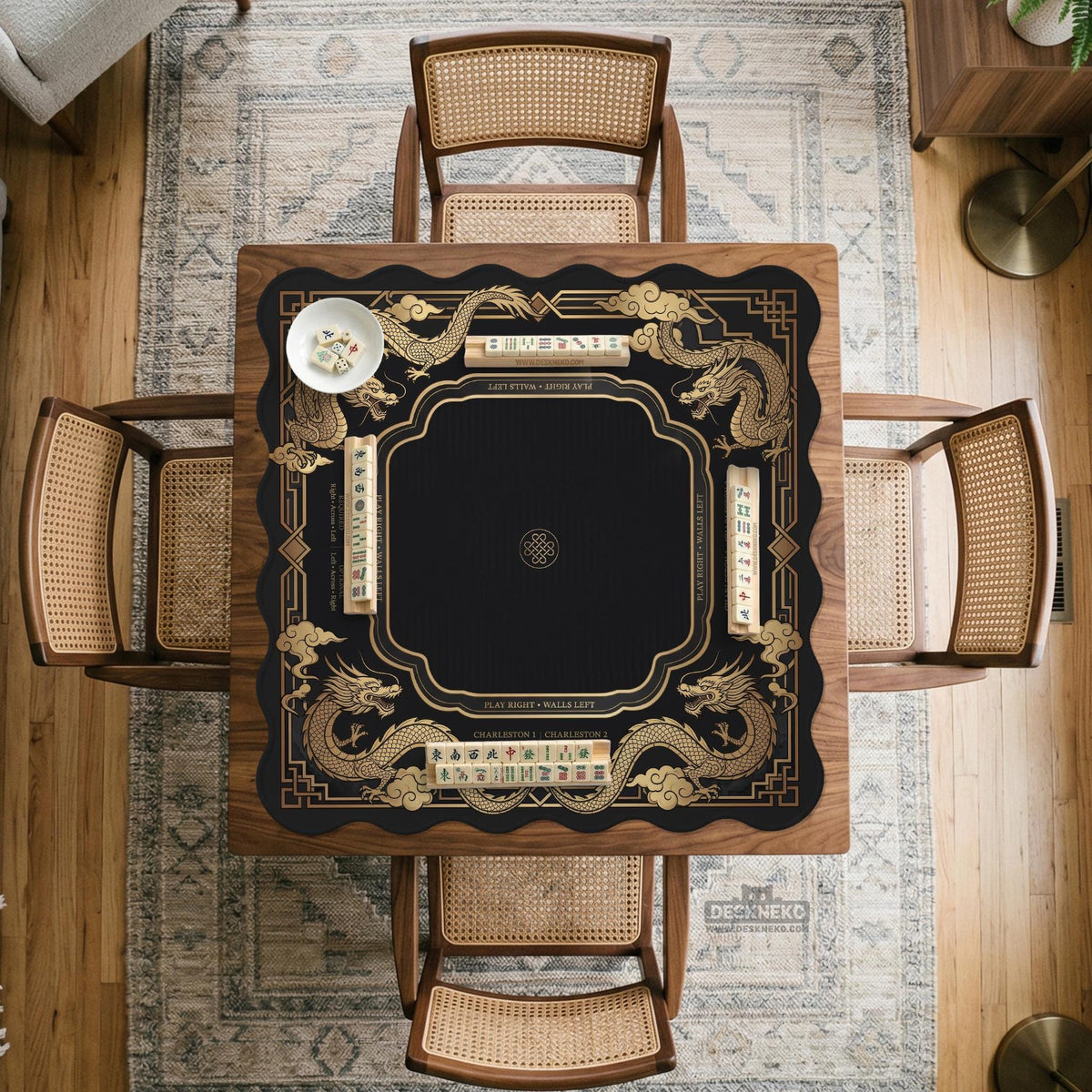 Black mahjong mat with gold dragon artwork, a scalloped edge, and printed Mahjong rules on the surface.