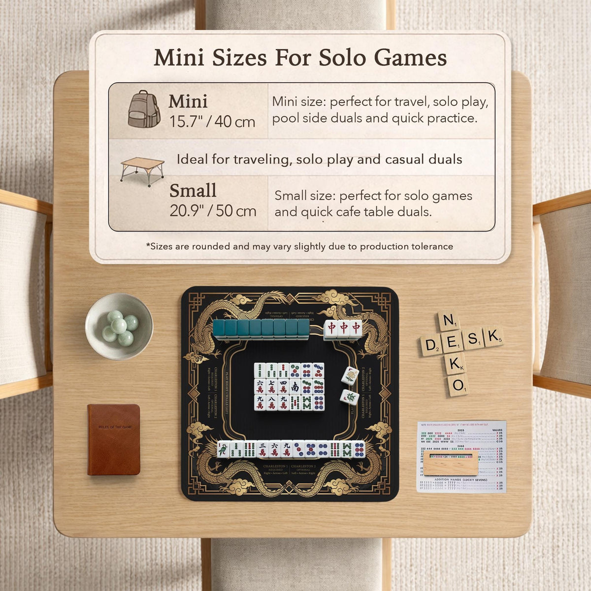 Black mahjong mat with gold dragon artwork, a scalloped edge, and printed Mahjong rules on the surface.