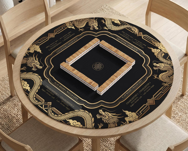 Black mahjong mat with gold dragon artwork, a scalloped edge, and printed Mahjong rules on the surface.