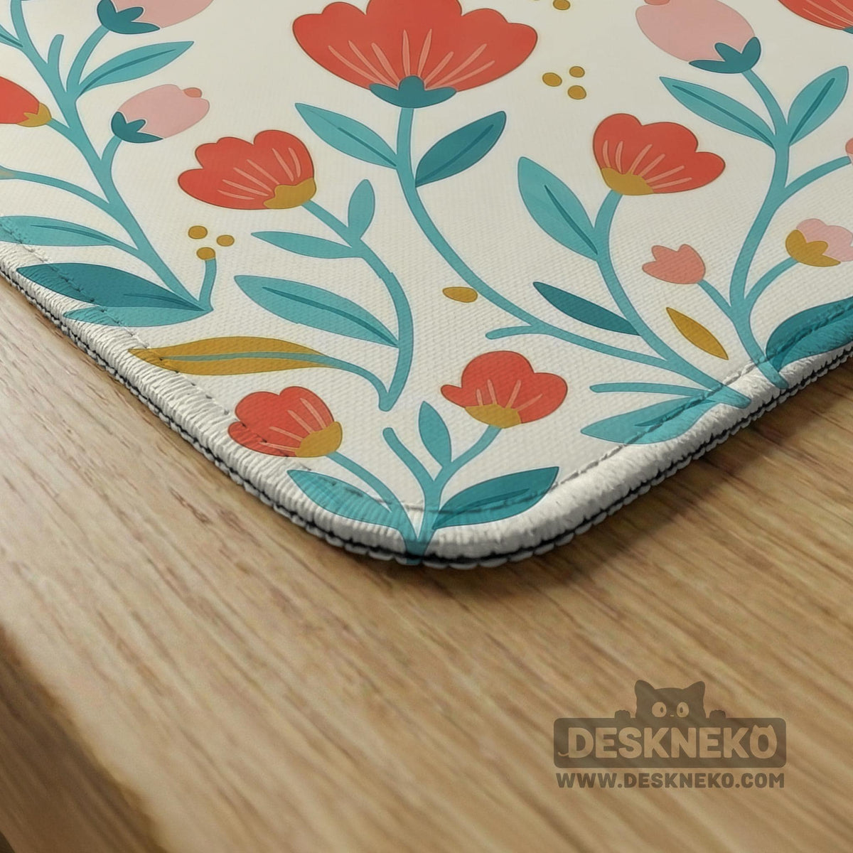 Cream mahjong mat with a coral and teal floral border, rule layout text, Charleston guide notes, and a blank center area for tile play.