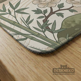 Square mahjong mat with a cream background, sage green cranes, bamboo leaves, peony branches, stones, and thin linework.