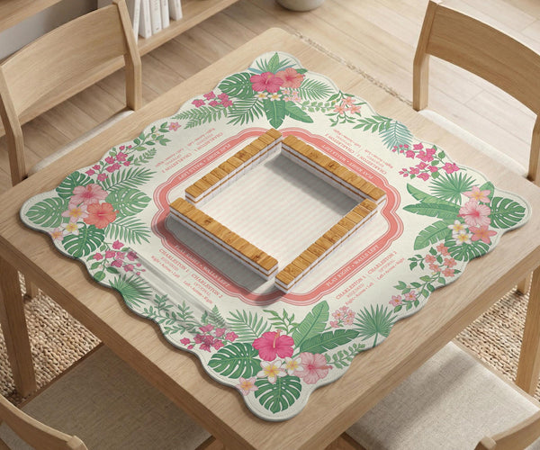 Coral tropical floral mahjong mat with hibiscus flowers, palm leaves, cream sections, and a scalloped edge.