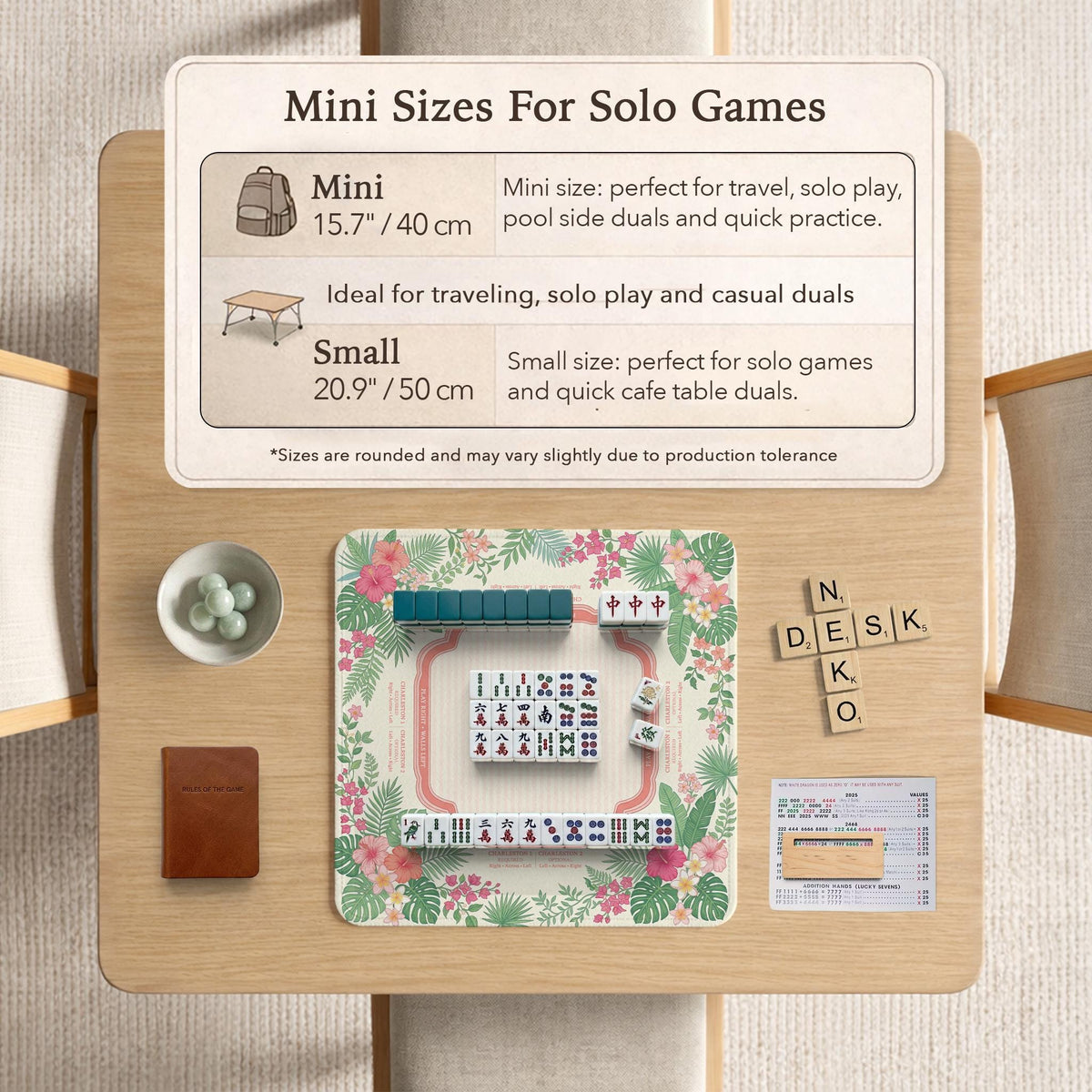 Coral tropical floral mahjong mat with hibiscus flowers, palm leaves, cream sections, and a scalloped edge.