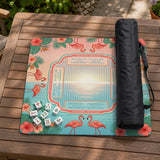 Pink mahjong mat with flamingos, palm leaves, hibiscus flowers, and aqua tropical background.