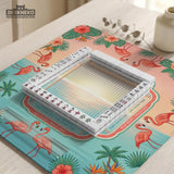 Pink mahjong mat with flamingos, palm leaves, hibiscus flowers, and aqua tropical background.