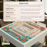 Pink mahjong mat with flamingos, palm leaves, hibiscus flowers, and aqua tropical background.