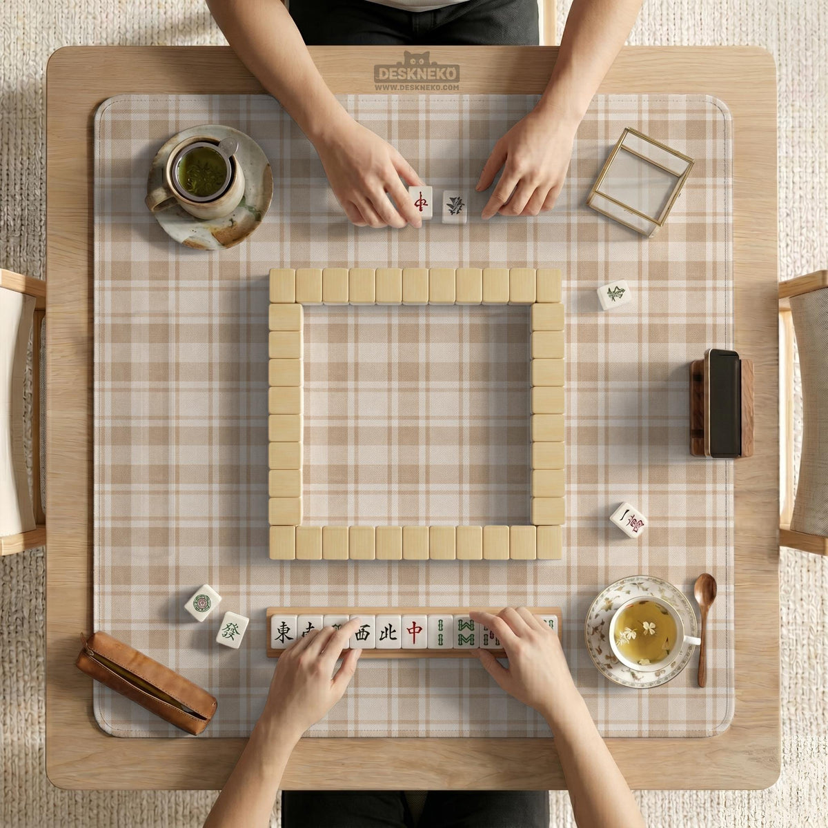 Beige plaid mahjong mat with a cream tartan pattern on a neutral background.