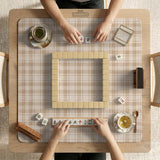 Beige plaid mahjong mat with a cream tartan pattern on a neutral background.