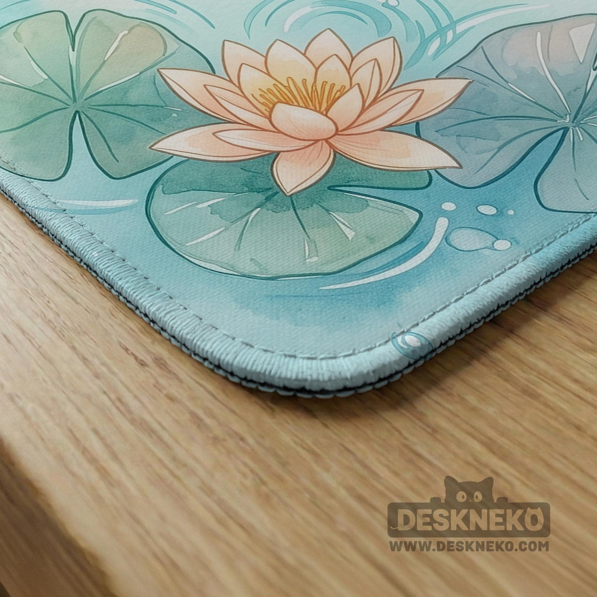 A soft blue mahjong mat with koi fish, floating lily pads, pale floral details, and a watercolor-style pond design.