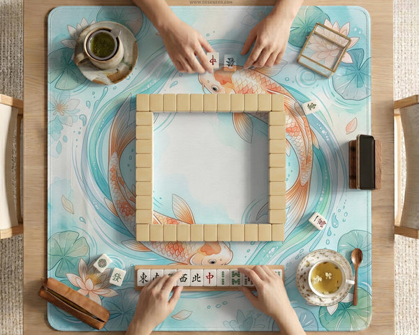 A soft blue mahjong mat with koi fish, floating lily pads, pale floral details, and a watercolor-style pond design.