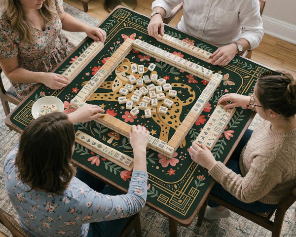 Dark green square mahjong mat with a golden spotted leopard in the center, surrounded by flowers, leafy stems, butterflies, and small star accents.
