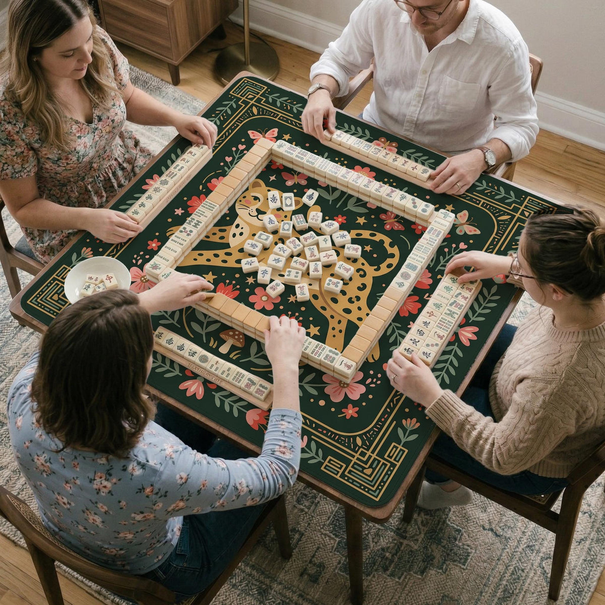 Dark green square mahjong mat with a golden spotted leopard in the center, surrounded by flowers, leafy stems, butterflies, and small star accents.