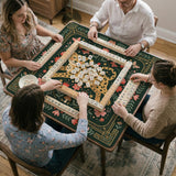 Dark green square mahjong mat with a golden spotted leopard in the center, surrounded by flowers, leafy stems, butterflies, and small star accents.
