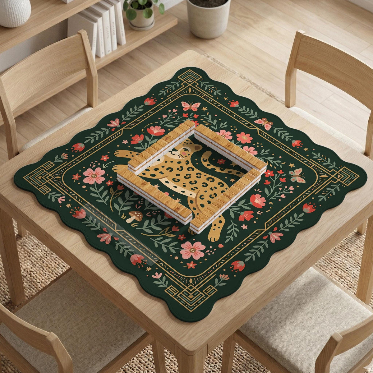 Dark green square mahjong mat with a golden spotted leopard in the center, surrounded by flowers, leafy stems, butterflies, and small star accents.