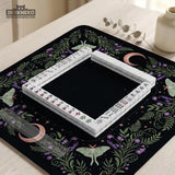 Black mahjong table mat with luna moths, purple flowers, soft green leaves, copper moons, and small star details.