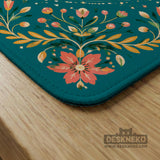 Green mahjong mat with a botanical bee and floral mandala design in teal, coral, cream, and gold.