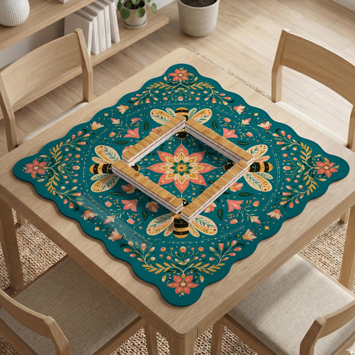 Green mahjong mat with a botanical bee and floral mandala design in teal, coral, cream, and gold.