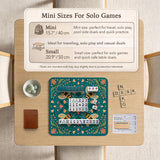 Green mahjong mat with a botanical bee and floral mandala design in teal, coral, cream, and gold.