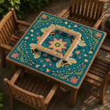 Green mahjong mat with a botanical bee and floral mandala design in teal, coral, cream, and gold.