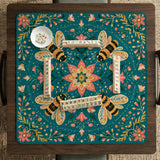 Green mahjong mat with a botanical bee and floral mandala design in teal, coral, cream, and gold.