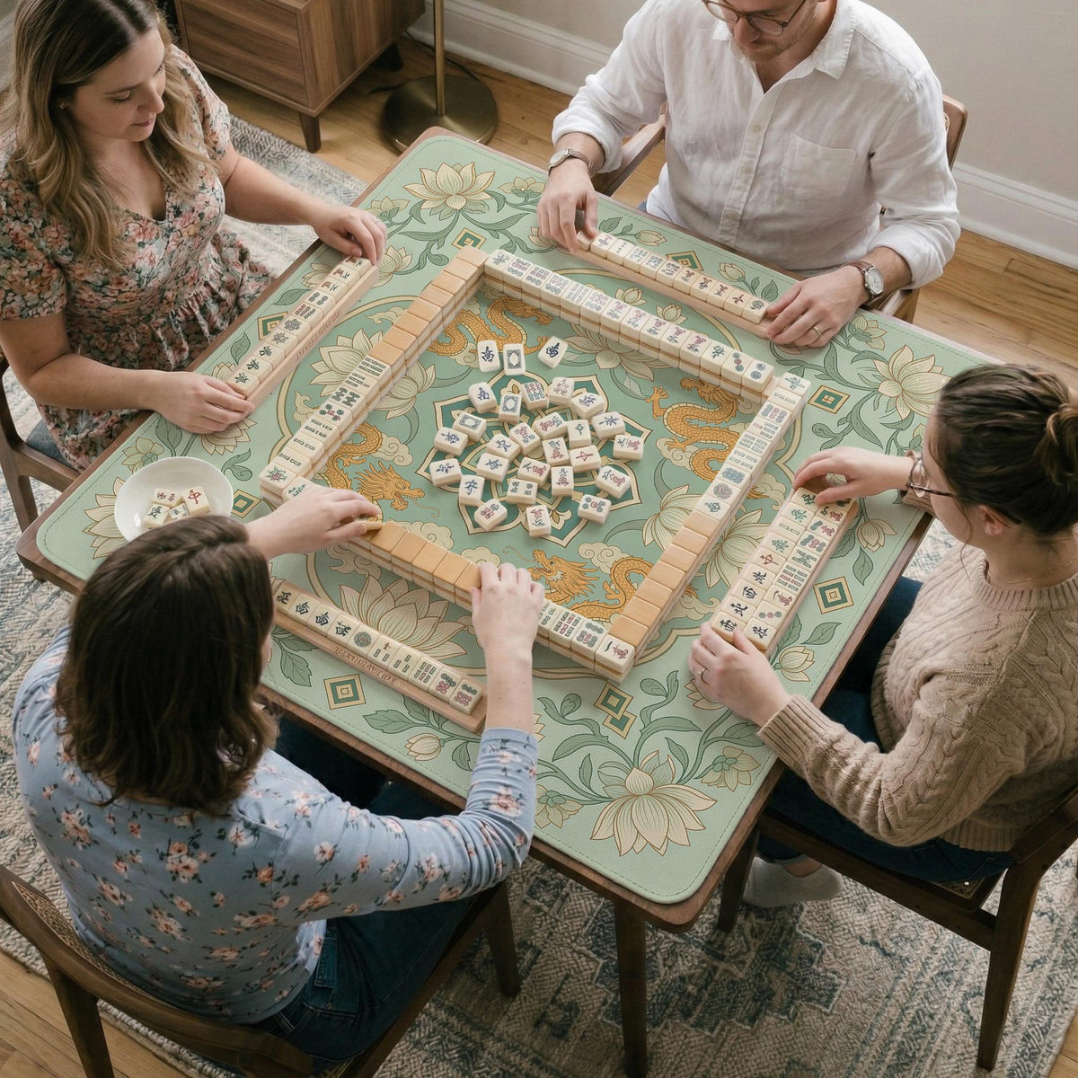 Sage green square mahjong mat with lotus flowers, golden dragons, and an ornamental center design.