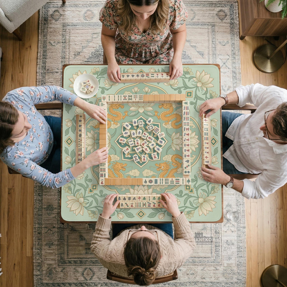 Sage green square mahjong mat with lotus flowers, golden dragons, and an ornamental center design.