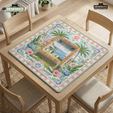 Pastel mahjong mat with a pink gingham border, seashells, hydrangea pots, palm trees, croquet details, and a coastal garden scene.