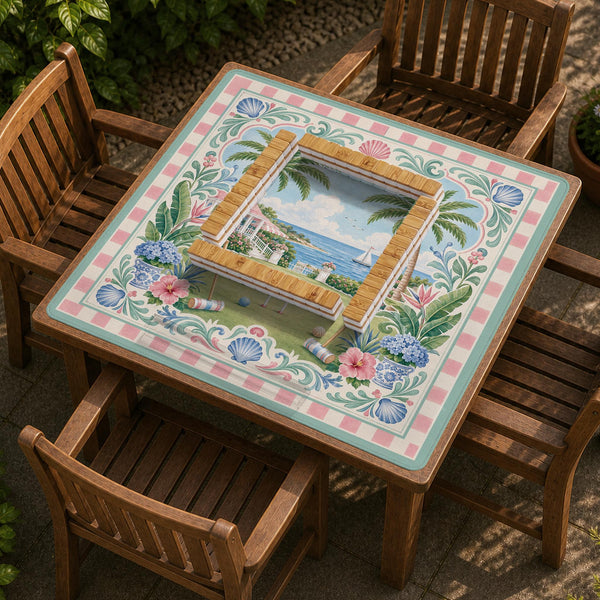 Pastel mahjong mat with a pink gingham border, seashells, hydrangea pots, palm trees, croquet details, and a coastal garden scene.