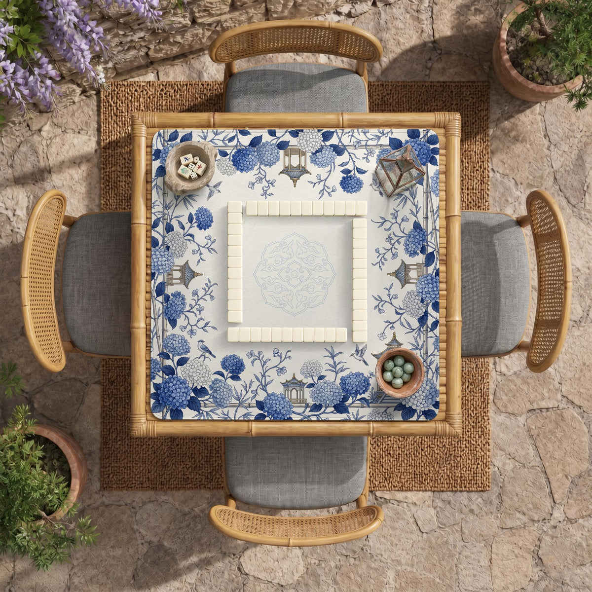 Blue and white square mahjong mat with a hydrangea and bird botanical border and a plain center area.
