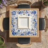 Blue and white square mahjong mat with a hydrangea and bird botanical border and a plain center area.