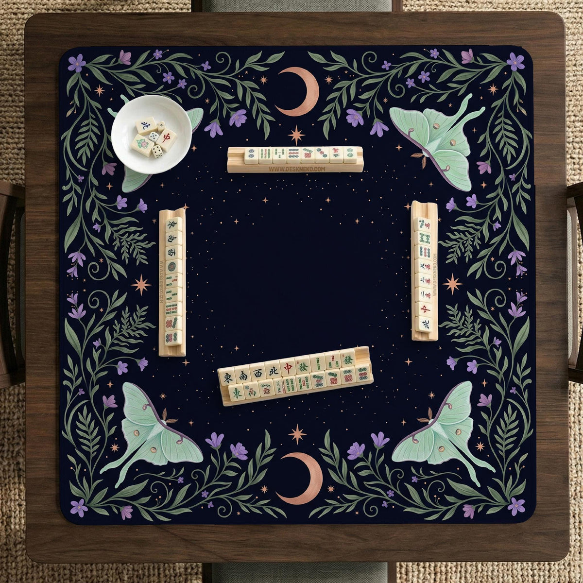 Navy square mahjong mat with a floral border, copper moons, scattered stars, pale moths, and leafy botanical details.