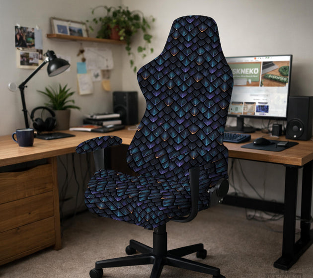An indigo desk chair cover with a dragon scale pattern in blue, navy, purple, and copper tones, shown as a stretch slipcover with coverage options.