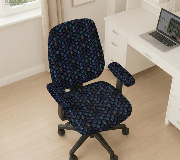 An indigo desk chair cover with a dragon scale pattern in blue, navy, purple, and copper tones, shown as a stretch slipcover with coverage options.