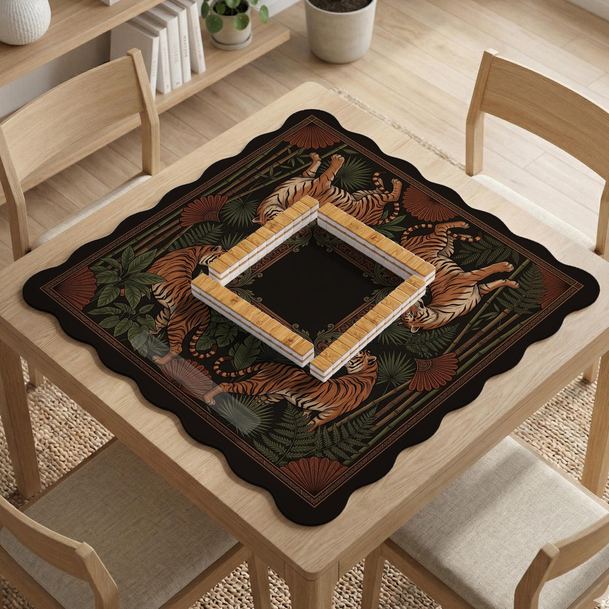 Black square mahjong mat with mirrored tiger faces, bamboo, dark tropical leaves, ornate border details, and orange accents.