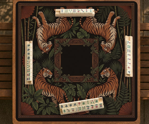 Black square mahjong mat with mirrored tiger faces, bamboo, dark tropical leaves, ornate border details, and orange accents.