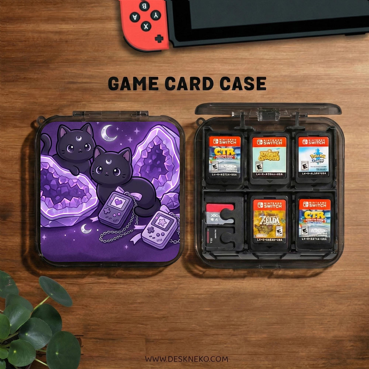 Purple carrying case with black cat faces, moon shapes, stars, and crystal geode style artwork for Nintendo Switch.