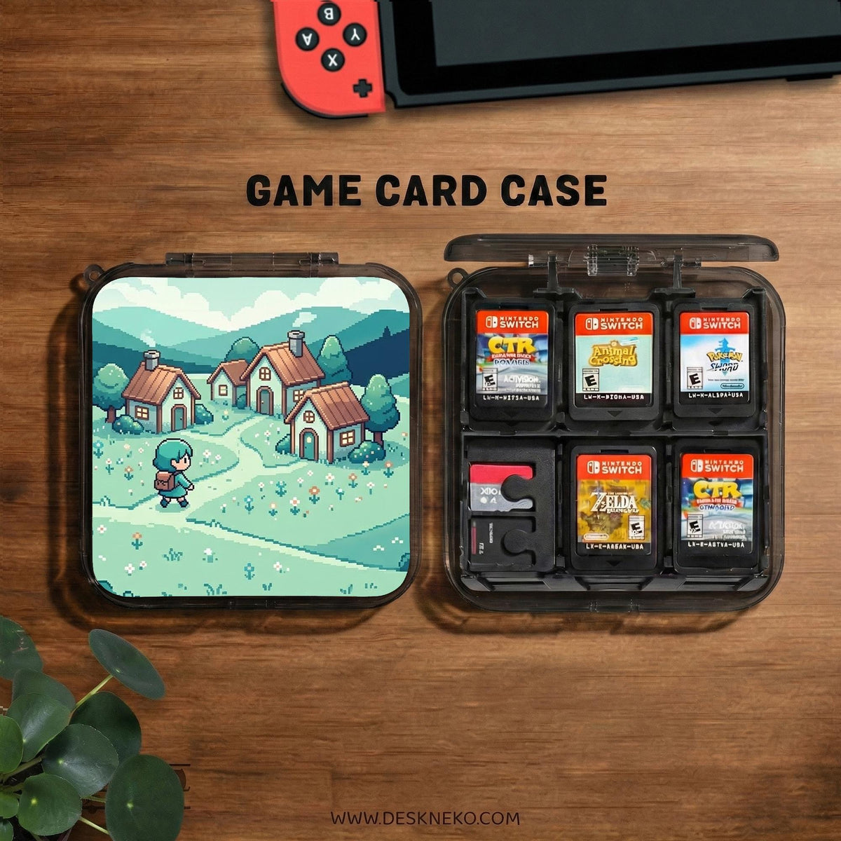 Teal carrying case with a pixel-style village scene, small houses, layered mountains, flowers, and a retro game-inspired landscape design.