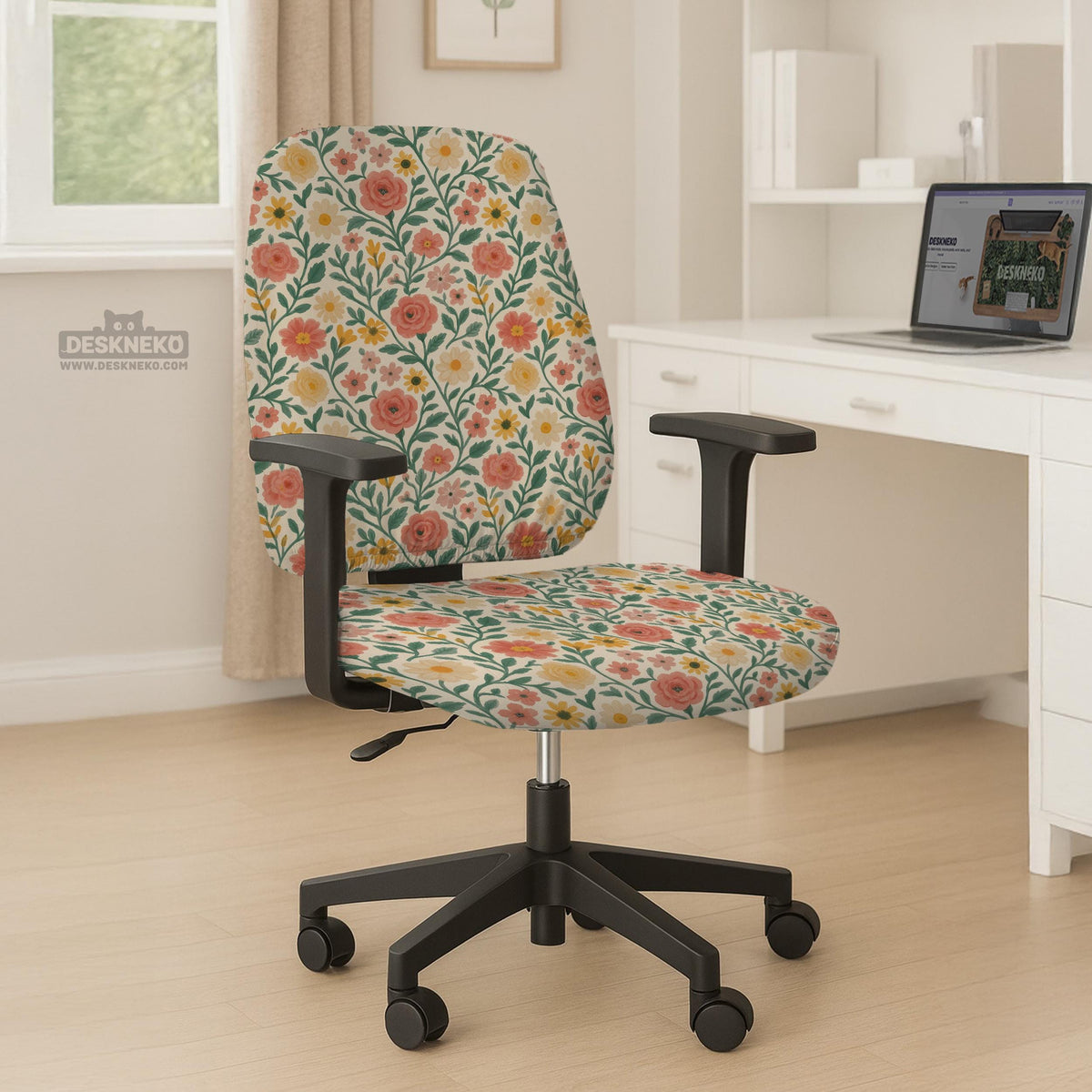 Cream desk chair cover with a vintage floral print featuring coral roses, mustard daisies, and green vines on a chair.